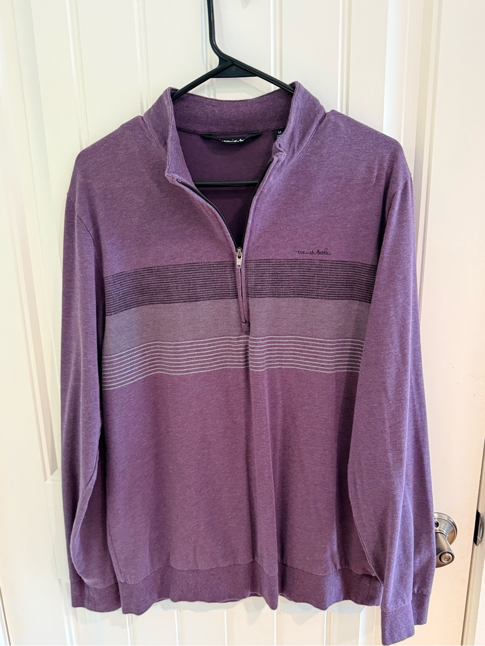Travis Mathew’s Purple Quarter-Zip Sweater